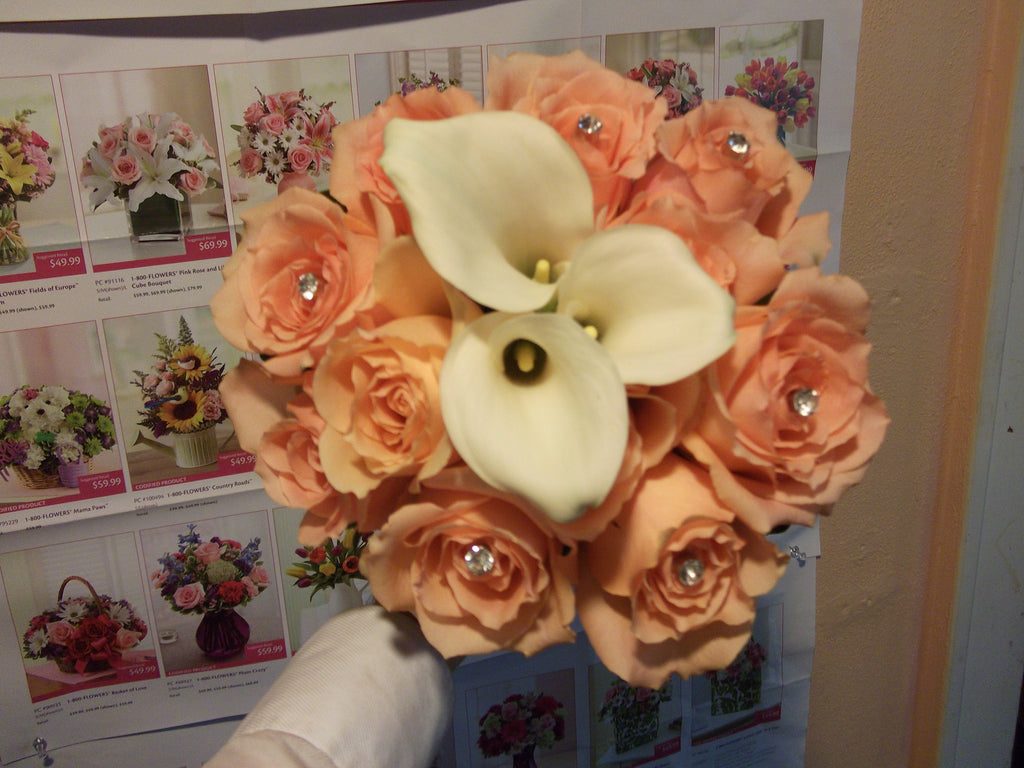 Calla lily and peach roses bride bouquet